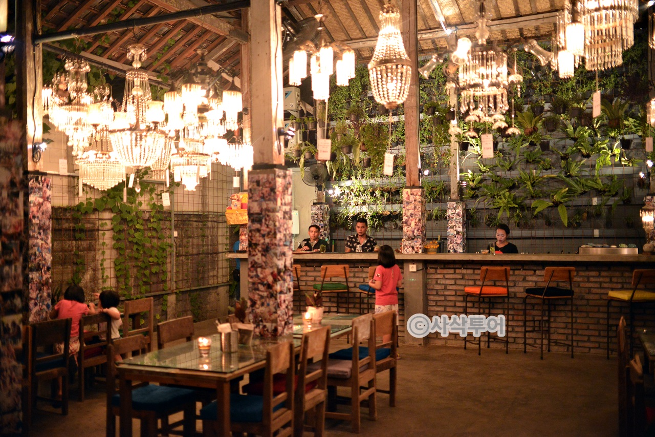 Chandeliers and greenery