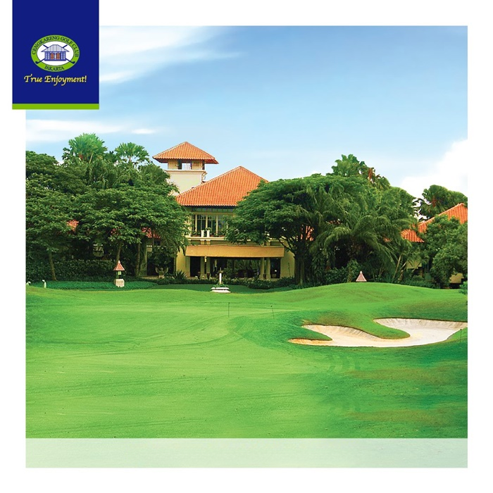 Clubhouse among tropical golf course grounds