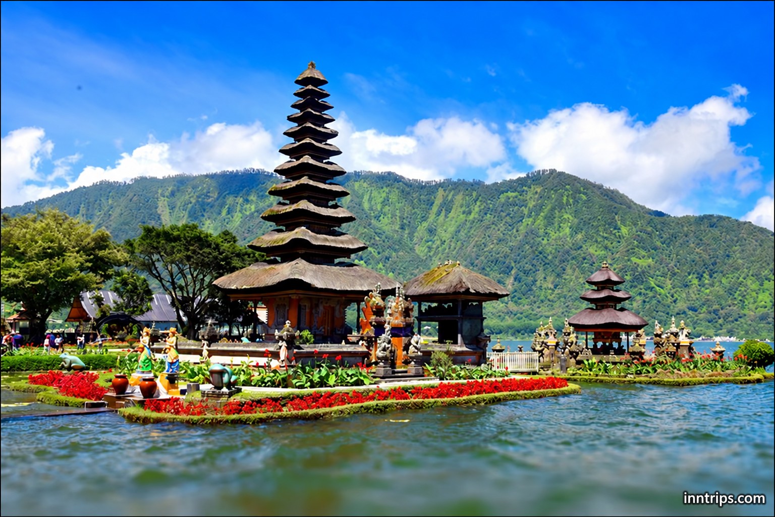 A temple framed by lake and mountains