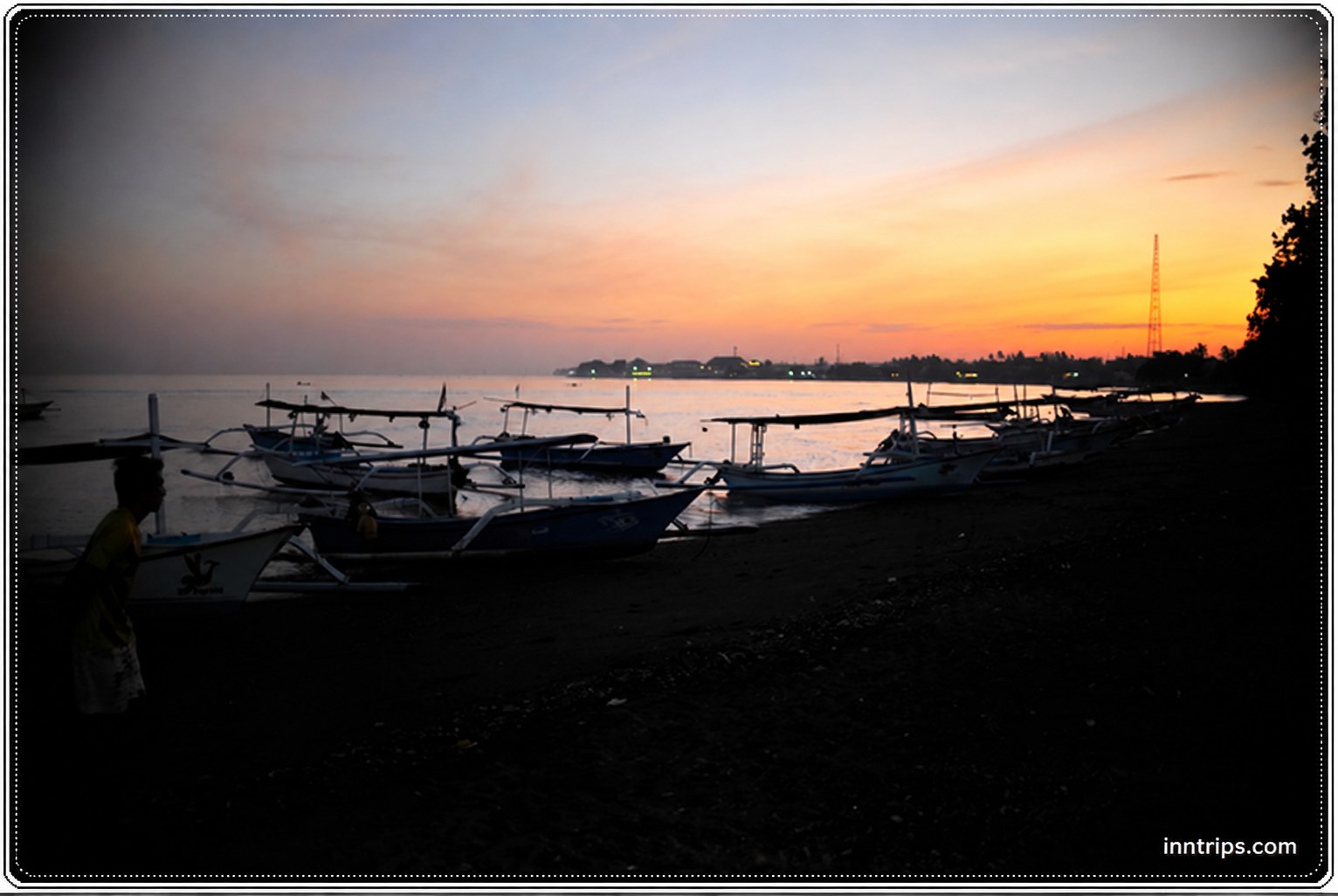 Traditional boats at sunrise in Lovina