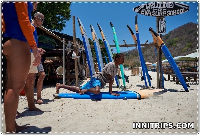 Meet your instructor on the beach · Lombok surf lesson photo 1