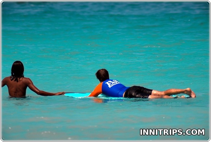 Guided surf practice in the sea · Lombok surf lesson photo 8
