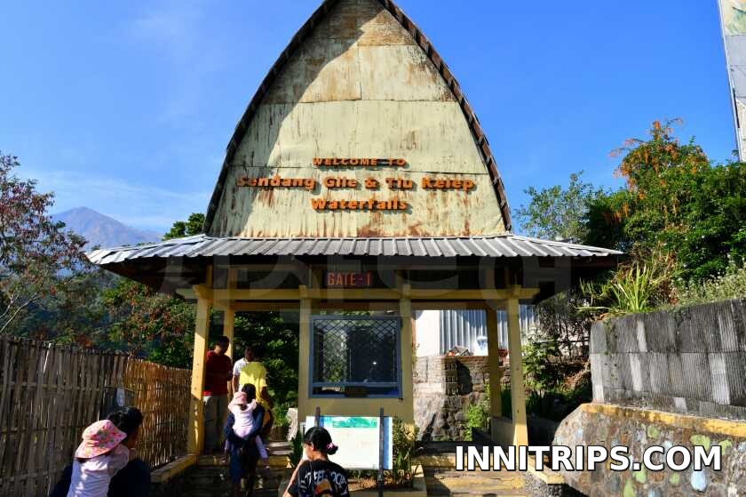 The quiet north coast and park entrance · North Lombok waterfall tour photo 11